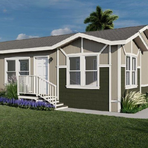 A charming manufactured home with a spacious front porch.