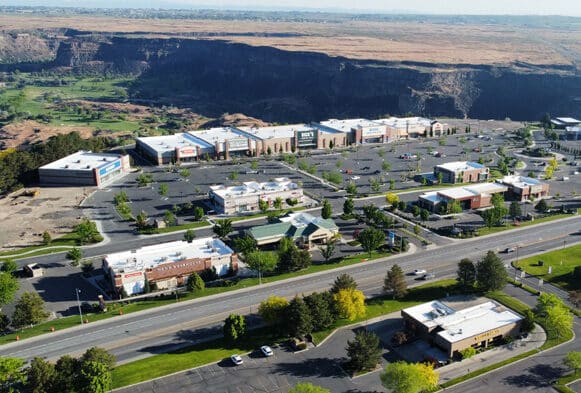 Brochure for Twin Falls Canyon Park West, focusing on community-focused land development and affordable housing.